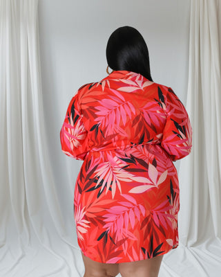 Tropical Muse Wrap Dress — plus-size collared V-neck tropical print dress with tie waist in coral, pink, and red tones — Tulley’s Boutique.