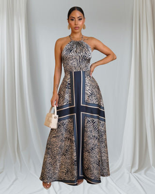 Zara Royale Maxi Dress — zebra print halter maxi with navy border — Tulley’s Boutique.