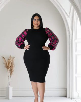 Plus size model wearing a black bodycon dress with bold pink plaid sequined statement sleeves, mid High dress