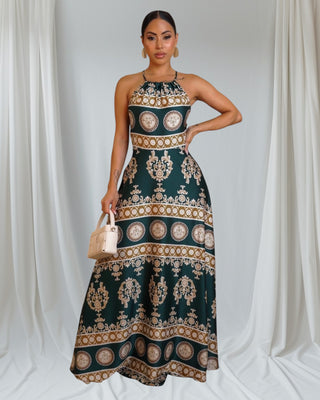 Golden Aura Maxi Dress — emerald halter maxi with gold baroque print — Tulley’s Boutique.