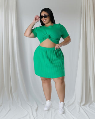 green matching skirt set showing high-waisted fit and flattering silhouette