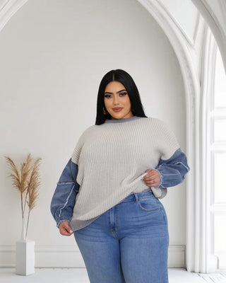 Model wearing Denim Fusion Knit Sweater – plus size gray knit top with denim sleeves