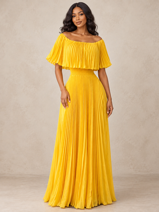 Woman in a yellow off-the-shoulder pleated maxi dress with flutter neckline and smocked waist, tall girls
