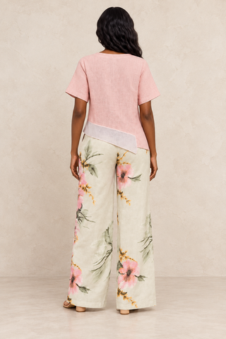 Back view of a blush pink linen top and beige floral wide-leg pants set – Tulleys Boutique