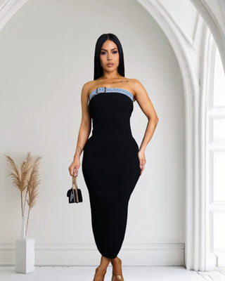  model wearing a stylish black midi dress with a denim strap detail, Bodycon fit
