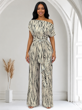 Model wearing the Isla Luxe Cream Tie-Dye One-Shoulder Wide-Leg Jumpsuit