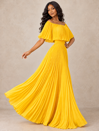 Side view of Woman in a yellow off-the-shoulder pleated maxi dress with flutter neckline and smocked waist, skirt swirling