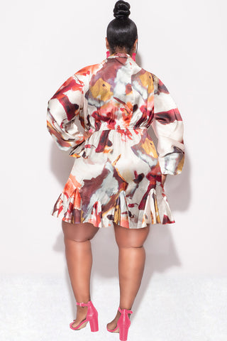 Curvy woman wearing colorful boutique mini dress