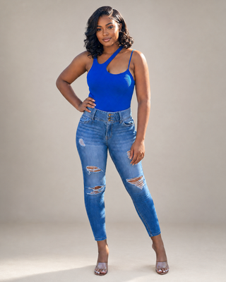 Model wearing the For The Love of Beauty Royal Blue Asymmetrical Bodysuit