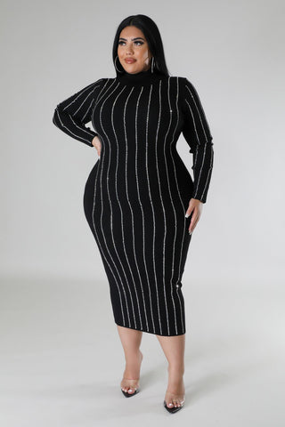 Model wearing plus-size black rhinestone bodycon midi dress with long sleeves and turtleneck