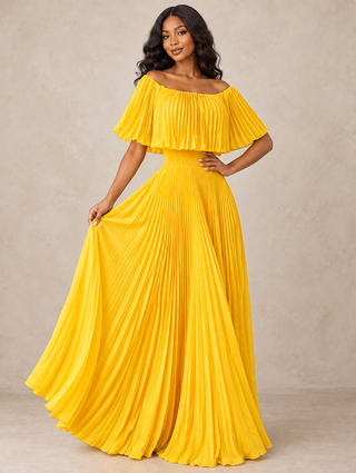 Front: Woman in a yellow off-the-shoulder pleated maxi dress with flutter neckline and smocked waist, skirt swirling