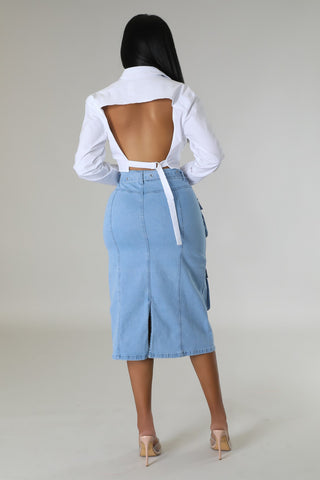 High-waisted light wash denim cargo skirt with utility pockets