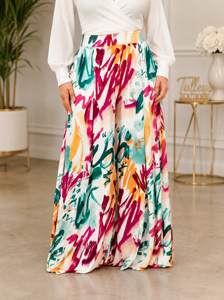 Painted Paradise women’s wide-leg palazzo pants with colorful abstract print front view