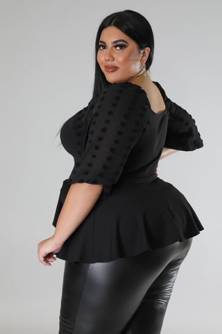 Woman wearing a black top