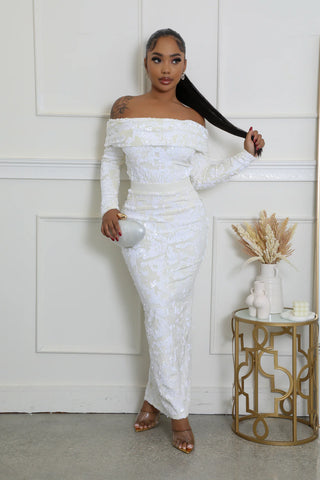 Ivory lace off shoulder long sleeve bodysuit styled with a fitted midi skirt