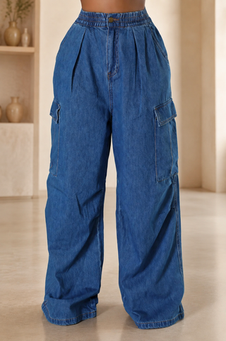  Utility Muse high\-waist wide\-leg denim cargo jeans with an elastic waistband and utility pockets\.