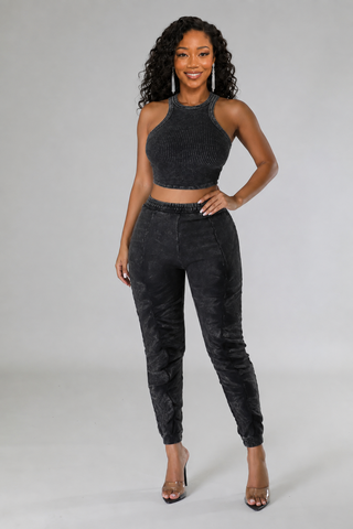 Front view of a model wearing a charcoal acid wash ribbed crop top and high\-waisted jogger pants two\-piece set\.