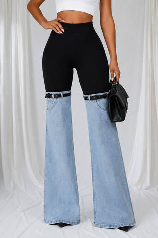Women’s black and light\-wash denim contrast flare pants with knee buckle accent