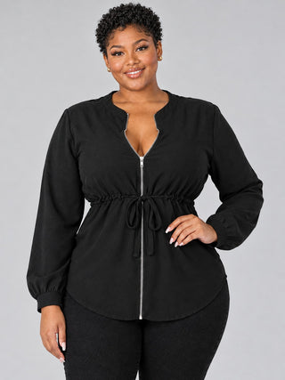 Close-up of black plus size blouse split neckline, silver front zipper and drawstring tie waist
