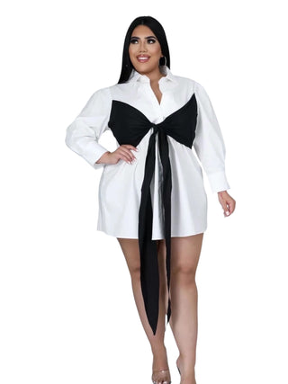 white shirt dress with oversized black bow detail
