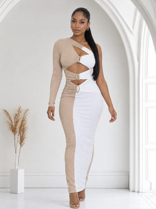 Model walking in beige and white color-block bodycon maxi dress with front cutouts and one long sleeve