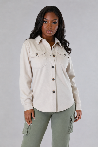  Cream long-sleeve utility shirt worn fully untucked