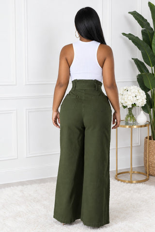 Back view of olive green high-waisted wide-leg denim pants with belt loops and back patch pockets