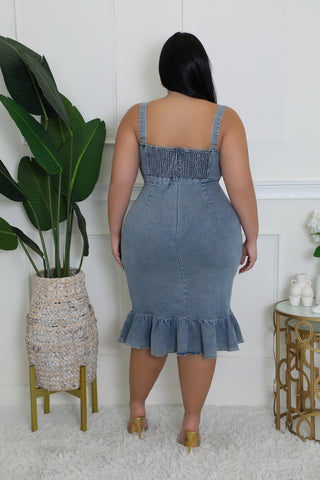 Back view of plus size denim midi dress with elastic smocked back and ruffle tail