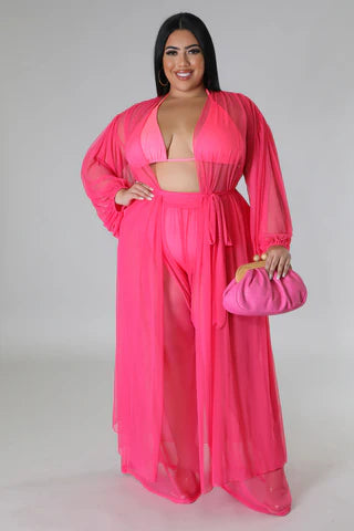 Woman wearing hot pink 3 piece pant set with sheer duster beach wear