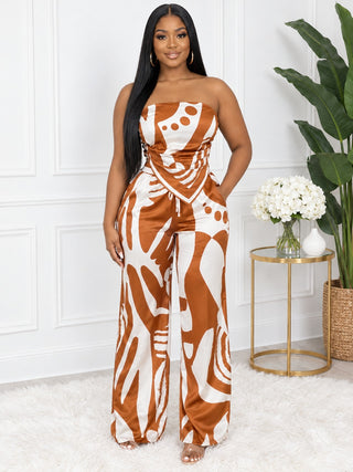 Jade Oasis two-piece set in rust and ivory abstract print – strapless scarf-hem top and wide-leg pants, front view – pull-on, no zipper, elastic back top and elastic back waistband