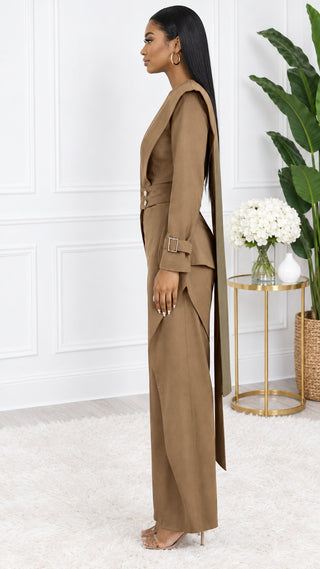 Side profile of the mocha brown two-piece set showing the shoulder sash falling down the back and the pleated wide-leg pants