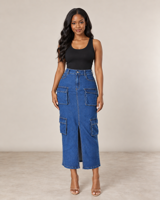 Petite model wearing a blue denim cargo maxi skirt with functional pockets and a front slit