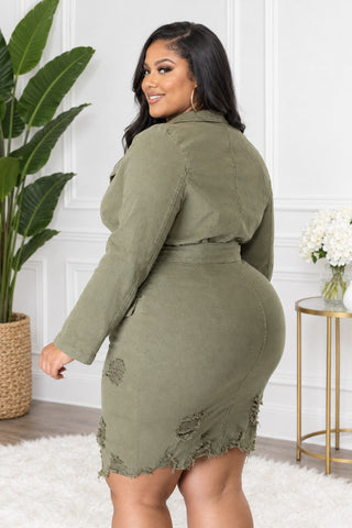 Back view of the olive green plus size denim blazer dress showing the fitted skirt, long sleeves and raw frayed hem