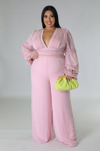 blush pink lace up jumpsuit with open back and crochet lace details
