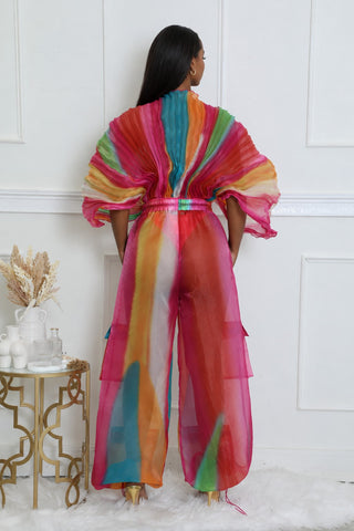 Back view of the pleated chiffon batwing bodysuit and sheer wide-leg pants with drawstring ankle hems