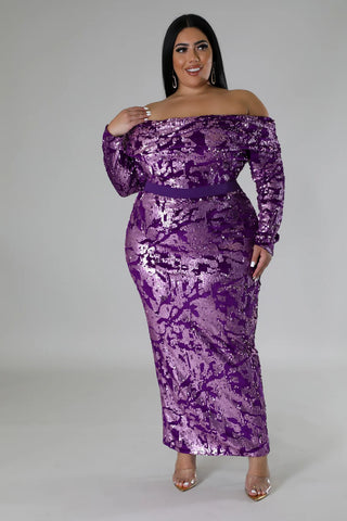 plus size woman wearing sequin off shoulder skirt set