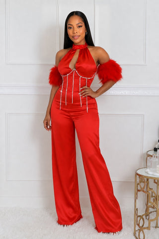 Front view of red satin rhinestone corset jumpsuit with halter neckline and underboob wire
