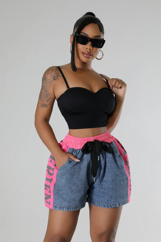 denim shorts with pink waistband and side panel detail