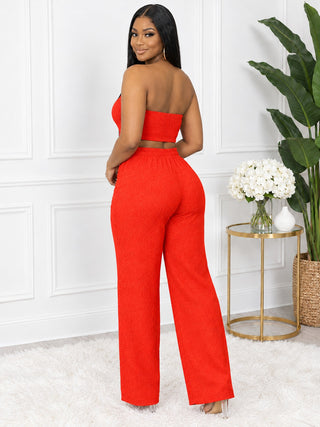 Back view of tangerine orange strapless crop top and wide-leg pants set – Tulleys Boutique