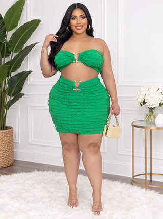Kelly green plus-size bandeau and mini skirt set with bubble texture and gold keyhole hardware at the waist