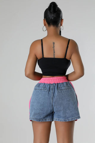 trendy boutique denim shorts with pink accents