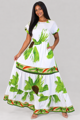 White tropical leaf print tiered maxi dress with short sleeves and pockets