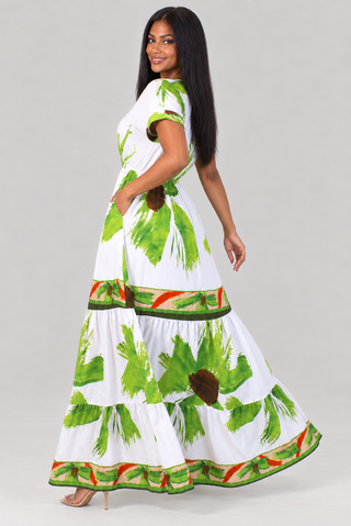 Side view Tropical leaf print maxi dress with gathered waist and flowing skirt
