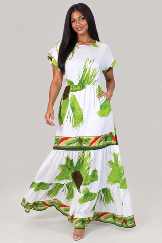 White tropical leaf print maxi dress with tiered skirt and elastic waist