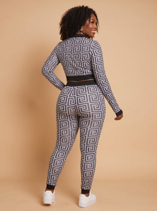 Back view of the black and white Greek key print crop top and leggings with black waistband and ankle cuffs