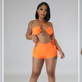 two piece swim set with side cutout shorts and tie details

